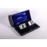 Victorian silver napkin rings with foliate decoration hallmarked Florence Warden, Chester 1896, in