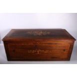 Antique musical box case with crossbanded border and inlaid bird and leaf design to the centre (