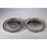 Pair of silver pierced footed dishes with monogram to well and marked sterling to base with other