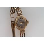 9ct gold cased ladies Rotary watch with 9ct gold gate link braclet, 12g.