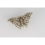 9ct gold opal and ruby set butterfly brooch by HBJ, 4cm across the wings, 4.3g.