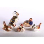 Group of Royal Crown Derby paperweights to include Puffin signed to the base, Duck with silver