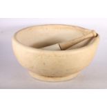 Large chemists footed mortar and pestle with wooden handle, 36 diameter.