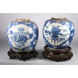 Pair of 19th century Qing Dynasty Chinese Kangxi style ginger jars, the oviform jars decorated