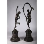 Pair of 19th century patinated bronze figures modelled as Venus and Mercury, on classical putti