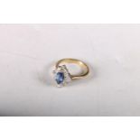 18ct gold marquise cut sapphire surrounded by clear stones, size J