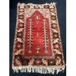 North west Persian rug with mihrab having two pillars, 151 x 101cm.