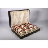 George V Shelley set of six demitasse coffee set, cups with silver mounts, in original box.