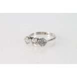 Platinum diamond set ring, each approximately .33 ct., size O, 3.1g.