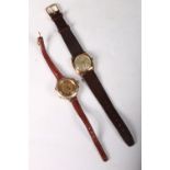 Early 20th c. gold octagonal cased wrist watch on leather strap, and another Alpina 9ct gold cased