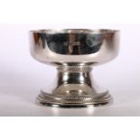 George V silver footed bowl, "The Devonshire Cream Bowl", after a Tudor bowl, hallmarked Thomas
