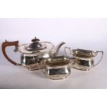 George V silver tea pot, 15cm, hallmarked C W Fletcher & Son Ltd, Sheffield 1931, with matching milk