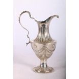 Georgian silver jug of classical form, hallmarks rubbed, 17cm, 165g.