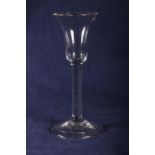 Late 18th Century wine glass with tulip bowl and folded foot.