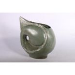 Studio pottery vase of aquatic form on oval base with character marks, 25cm.