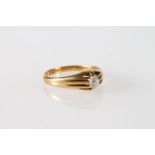 18ct gold ring with single diamond in channelled tapering setting, size Q, 3.7g.