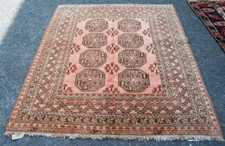 Antique Afghan hand-knotted rug with two rows of four geometric octagonal medallions interspersed by