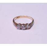 Diamond three-stone ring with old-cut brilliants, the largest .2ct, ‘18ct’, size L.