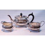 Silver three-piece tea set of panelled ovoid shape, by E Viner, Sheffield 1929, 1,124g or 36oz.