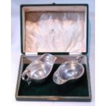 Pair of silver sauce boats with gadrooned edges, on collet feet, by S Blankensee & Sons, for Edward,