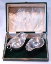 Pair of silver sauce boats with gadrooned edges, on collet feet, by S Blankensee & Sons, for Edward,