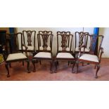 Set of eight Chippendale Revival mahogany dining chairs, including a pair of carvers, each with