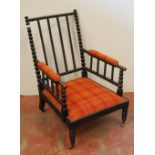 Victorian ebonised bobbin armchair, the arm rests and seat upholstered in later tartan stuff-over