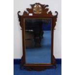 19th century-style mahogany fret-carved wall mirror, 88cm high and 47cm wide.