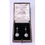 Pair of diamond drop earrings, each with a cluster of nine-old cut brilliants dependant from