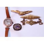 Lady’s 9ct gold wristwatch on strap, a Georgian mourning brooch and three others, metal.  (5)