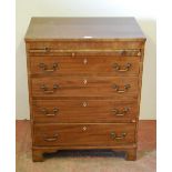 Mahogany bachelor's chest of drawers in the George III style, c. early 20th century, with pull-out