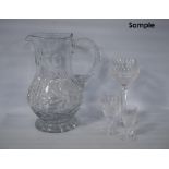 Suite of Waterford Crystal comprising assorted matching glasses, and a near-matching water jug.  (