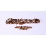 Gold gate bracelet, ‘9ct’, with matching brooch, 14.7g.