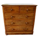 19th century mahogany chest of two short and three long graduated drawers, with turned handles, on a