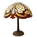 Good quality Tiffany of New York-style table lamp with large multi-coloured stained leaded shade, on