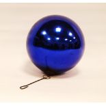 Kugel of Germany cobalt blue mercury glass ball light pendant with brass cap to the underside.