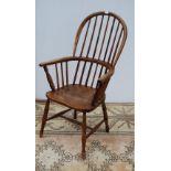 19th century ash and elm Windsor armchair with hoop framed stick back, on spindle supports united by