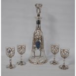 Silver overlaid glass liqueur set comprising a decanter and stopper, and four matching glasses,