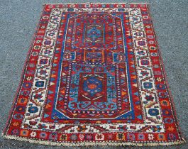 Antique Turkish Anatolian-style hand-knotted rug decorated with precious objects and all over