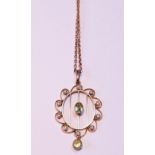 Edwardian gold openwork pendant with pearls and peridot, ‘9ct’, 5.3g gross.