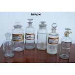 Large collection of antique glass apothecary or chemist's bottles, some examples named, some without