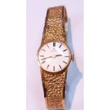 Lady's Omega 9ct gold bracelet watch, 1975, 19g gross.