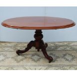 Victorian mahogany breakfast table, the detachable oval top on turned pedestal base with shaped