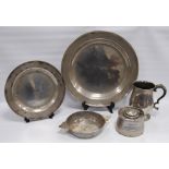 Group of 18th century and later pewter to include a twin-handled porringer, charger with touch marks
