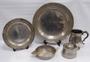 Group of 18th century and later pewter to include a twin-handled porringer, charger with touch marks