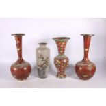 Pair of Oriental cloisonné enamel bottle vases, 31cm high, a red ground cloisonné baluster vase