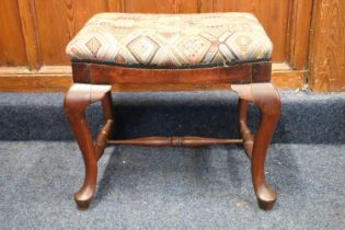 A mahogany stool, with upholstered seat, cabriole legs and pad feet, 54cm wide. #90