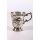 Continental silver christening mug with embossed floral decoration, marks rubbed, 101g, 9cm high. #
