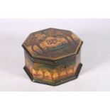 Art Nouveau style pen work treen box of octagonal section decorated with orange tree and lake scene,