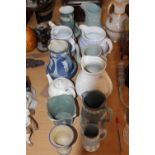 Group of jugs, most sprigged, including Wedgewood, 19cm, part basket weave cup marked Wilson, etc.